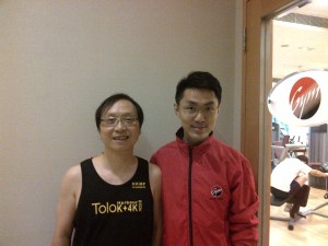 Picture with Trainer Calson outside of gym